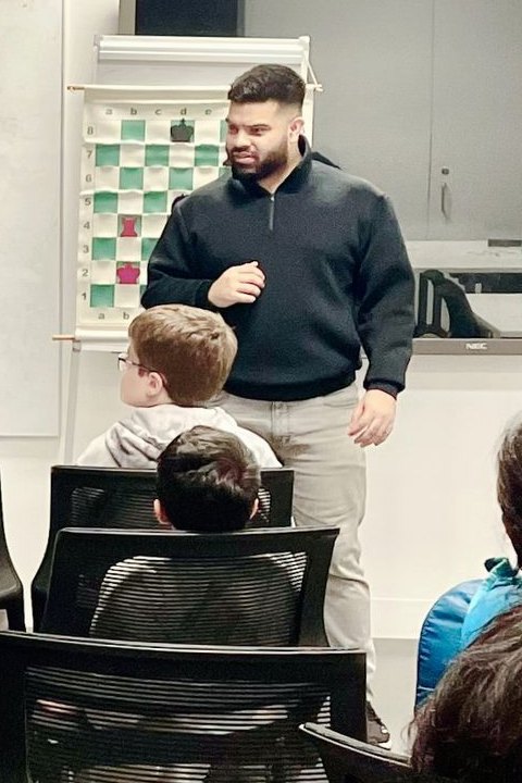 Coach Kheminda leading an Oz Chess Kids class